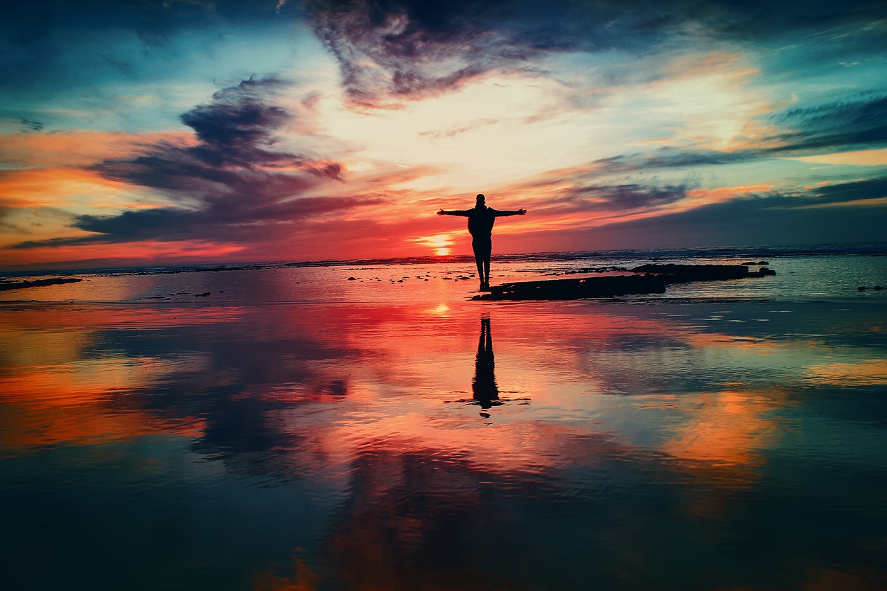 A person looking at the sky, contemplative