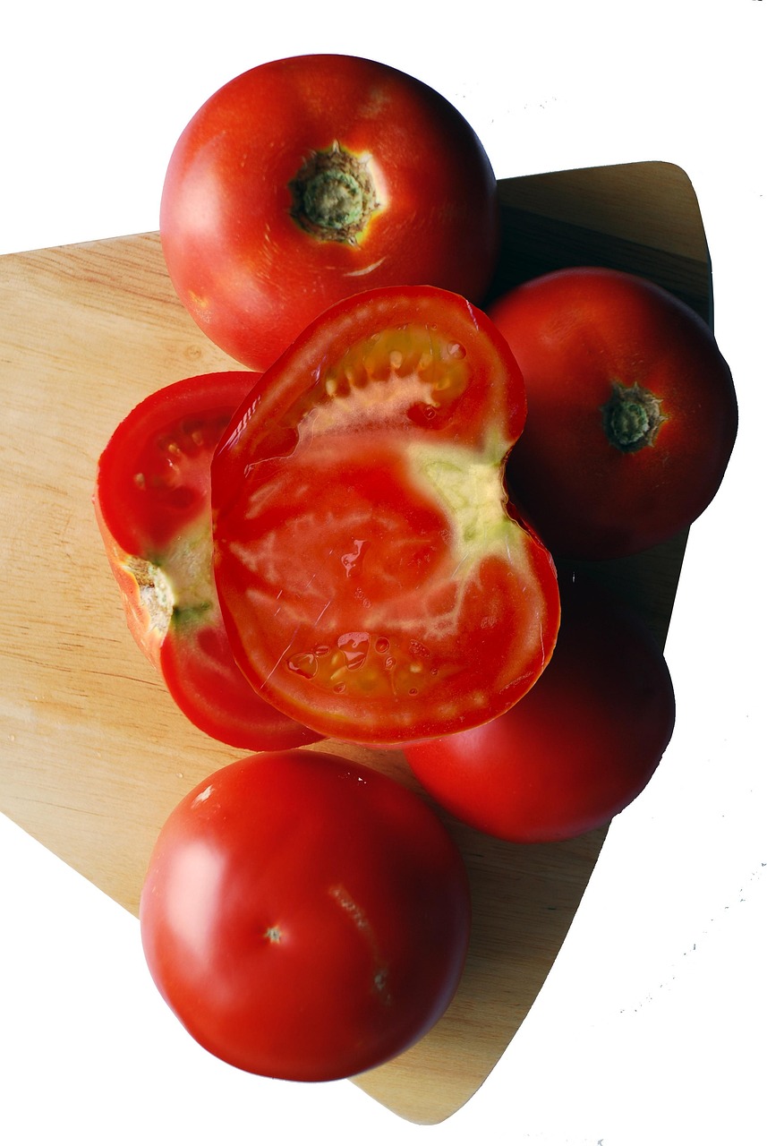 Tomatoes, whole and sliced